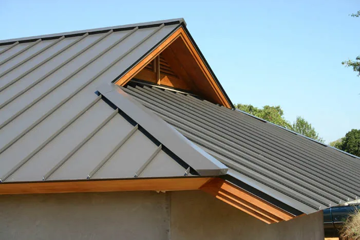 Standing seam metal roof in medium bronze