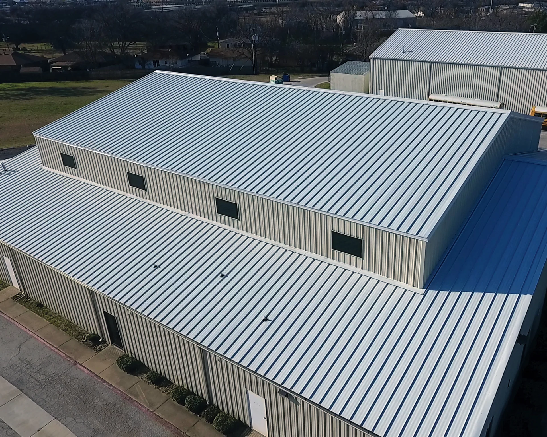 White standing seam metal roof on a North Texas home